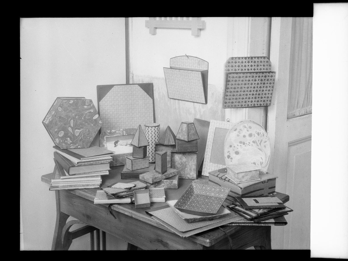 Stacks of books on a small table