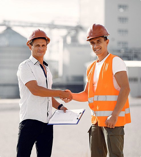 Createx engineers shaking hands on site