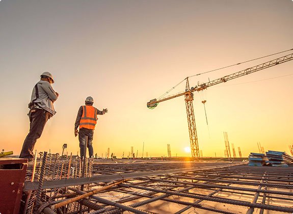 Createx crew working on a construction site at sunset