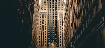 Manhattan skyscrapers seen from the street, looking straight up