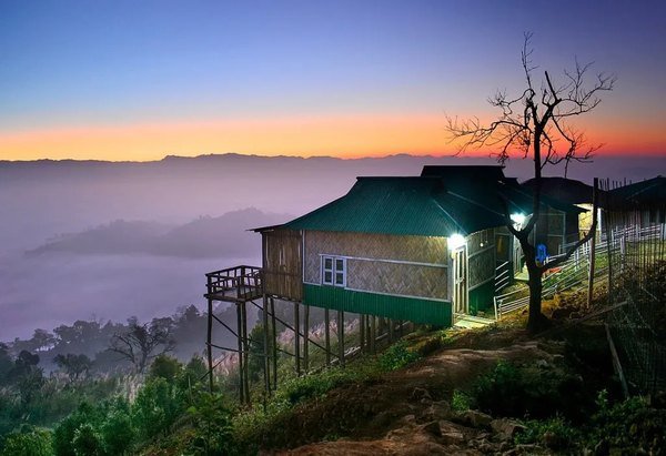 Sunrise over the hills of Sajek Valley